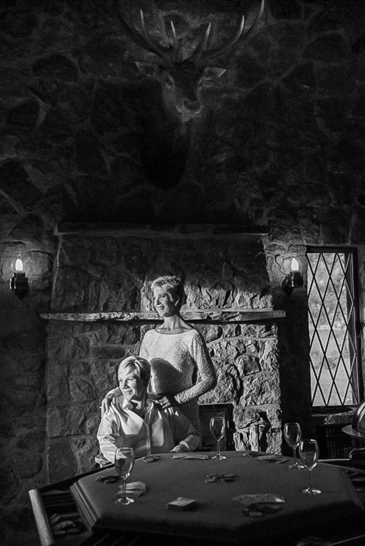 two brides in the poker room at Thunderbird Lodge in Lake Tahoe