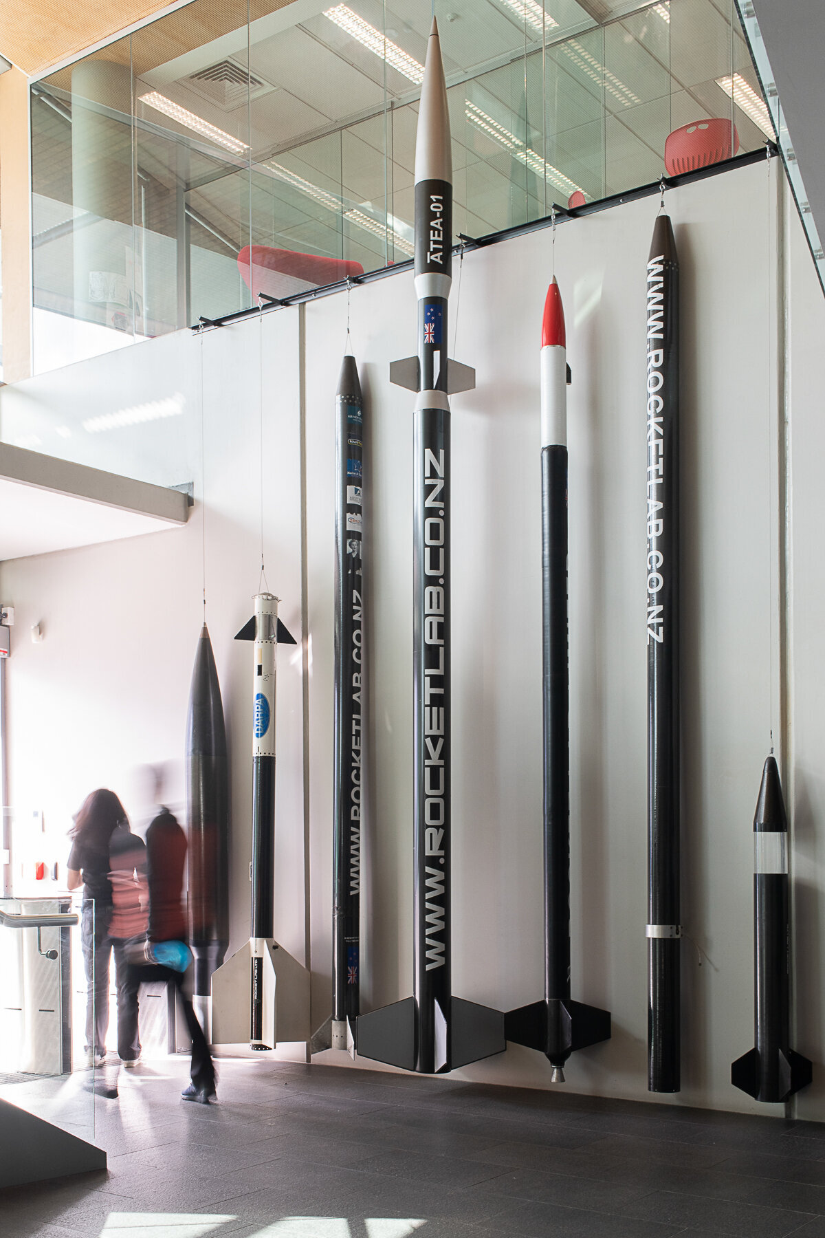 Rocket lab's Auckland Production Centre. Foyer shot showing Peter Beck's numerous test rockets mounted to the wall
