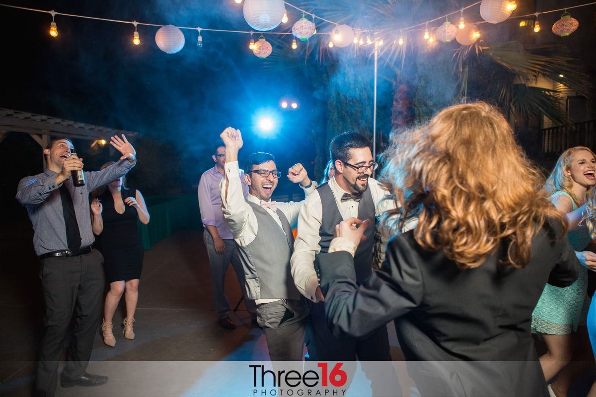 Groom and Guests dance at the reception