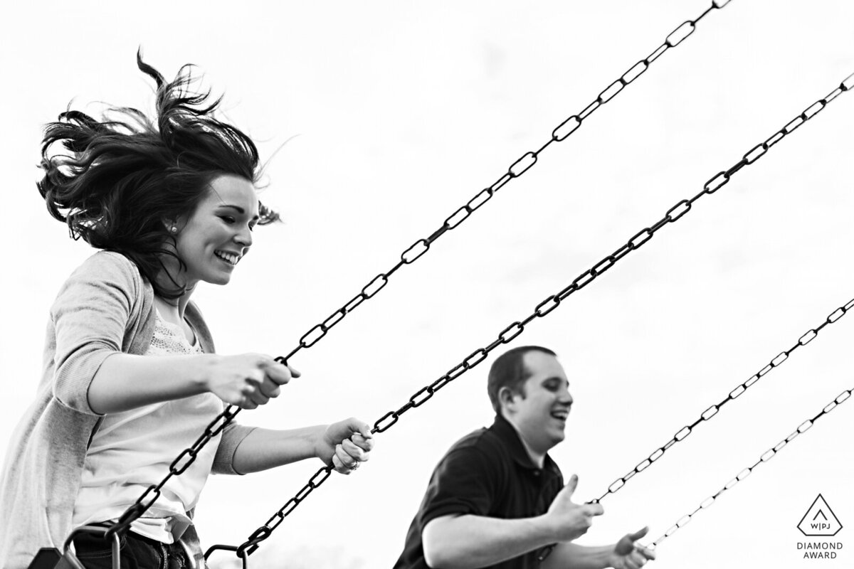 Massachusetts Engagement Session on the swings in the summer