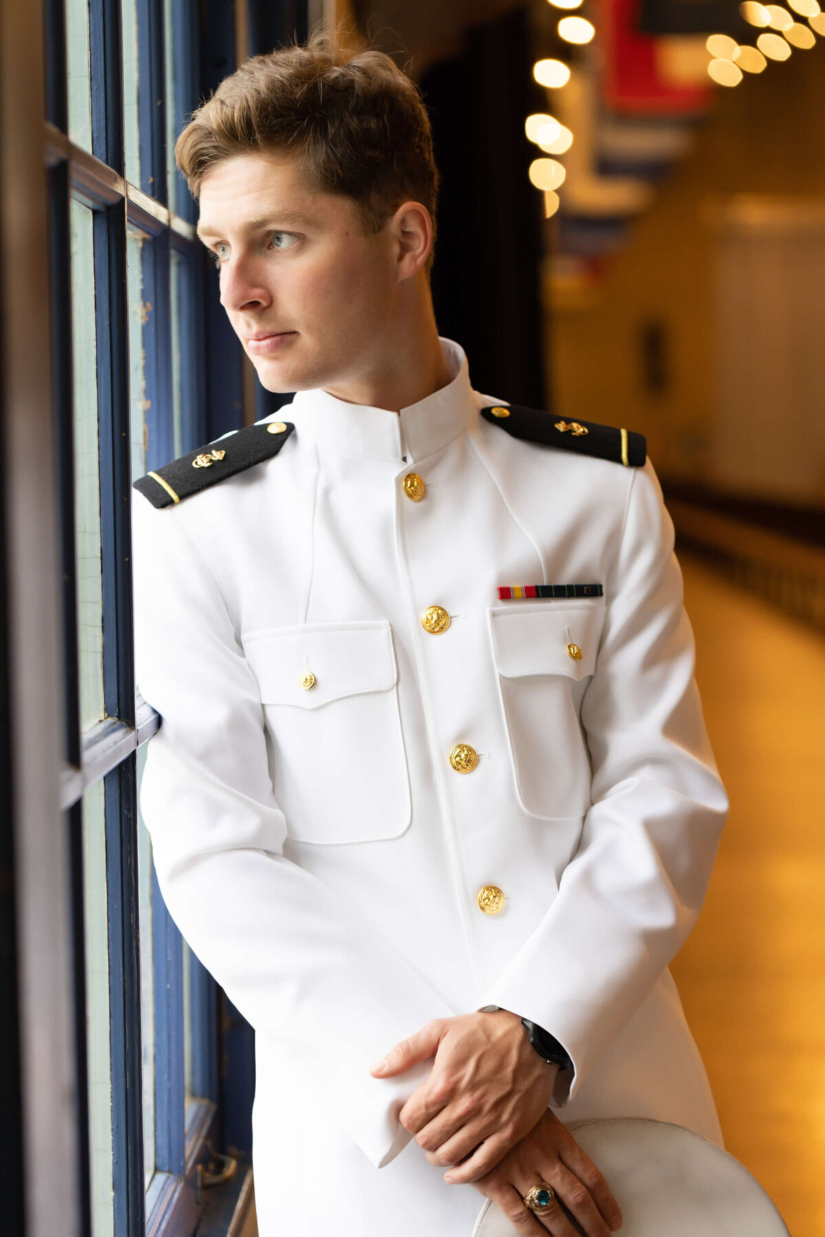 USNA Midshipman senior portrait in Dahlgren Hall at Naval Academy in Annapolis, Maryland.