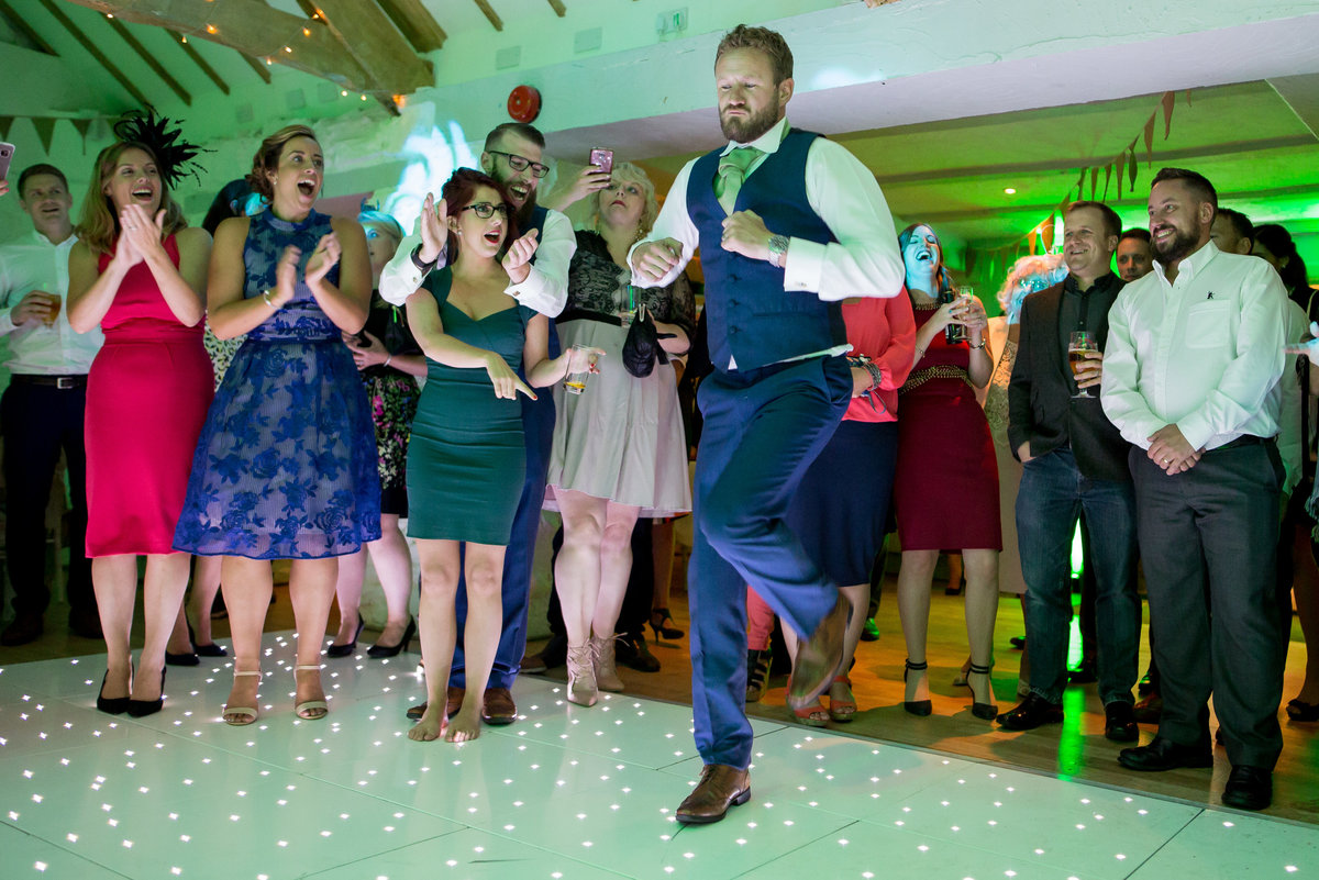 groom dancing photo at bickley mill devon