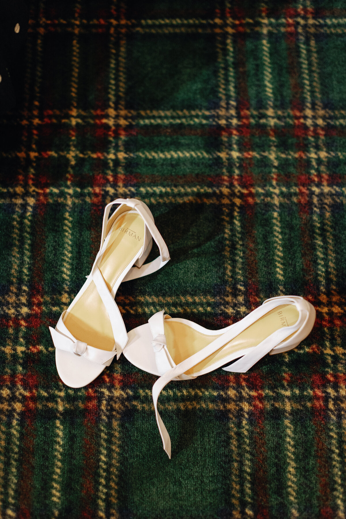 wedding-shoes-on-plaid-carpet
