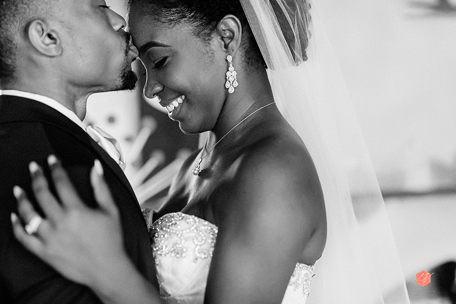 Bahamas wedding groom kissing bride on forehead