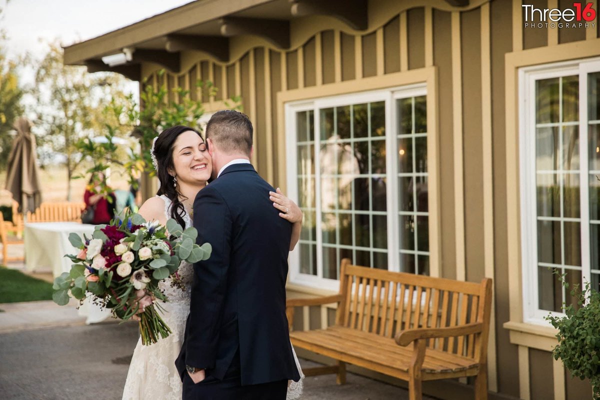 A tender moment at Ponte Winery Wedding Venue in Temecula, CA
