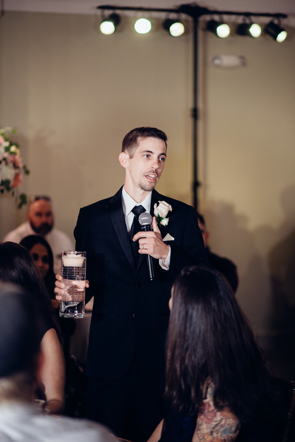 Wedding Photograph Of Groom Holding A Microphone Los Angeles