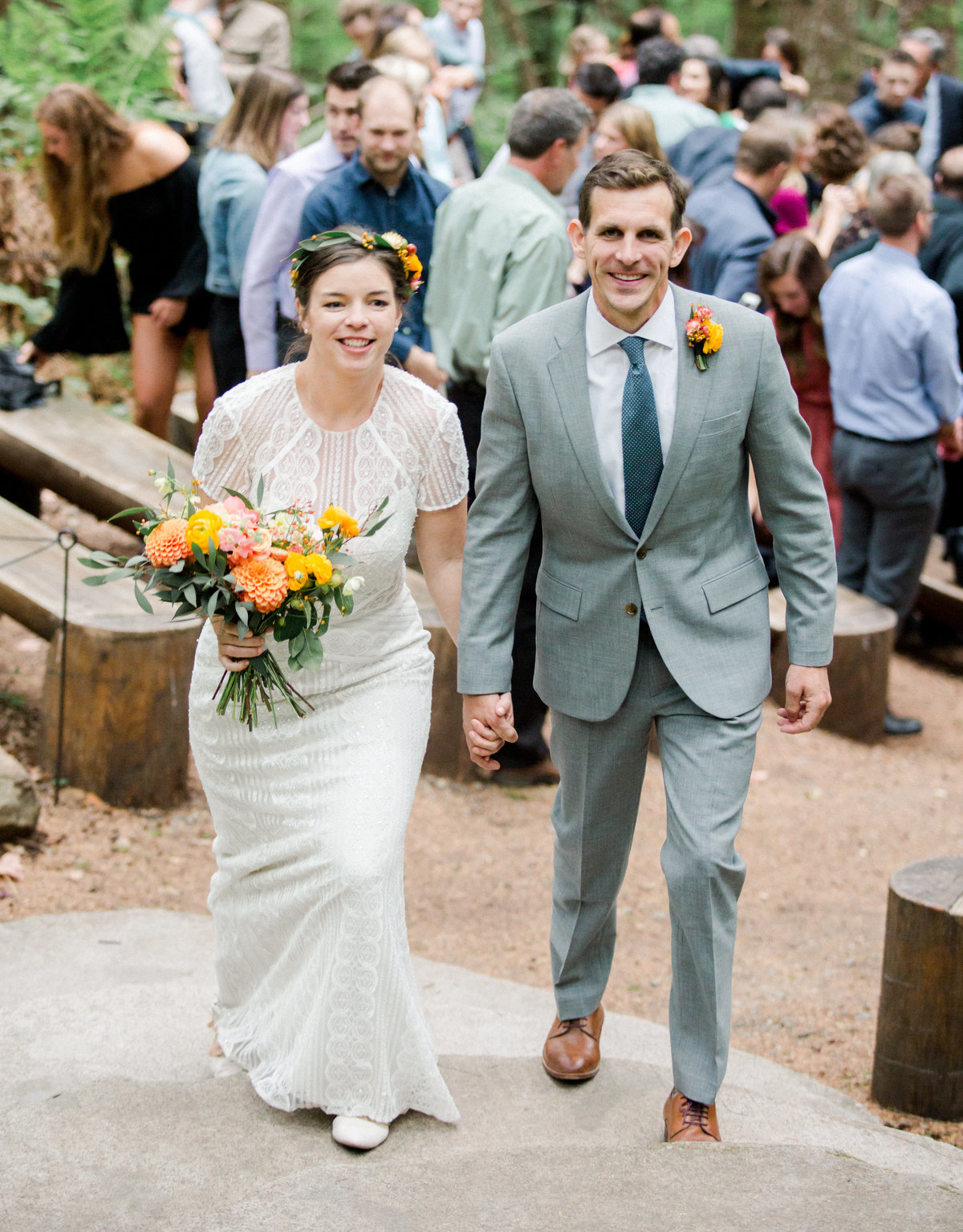 bride and groom just married recessional down the woodland aisle