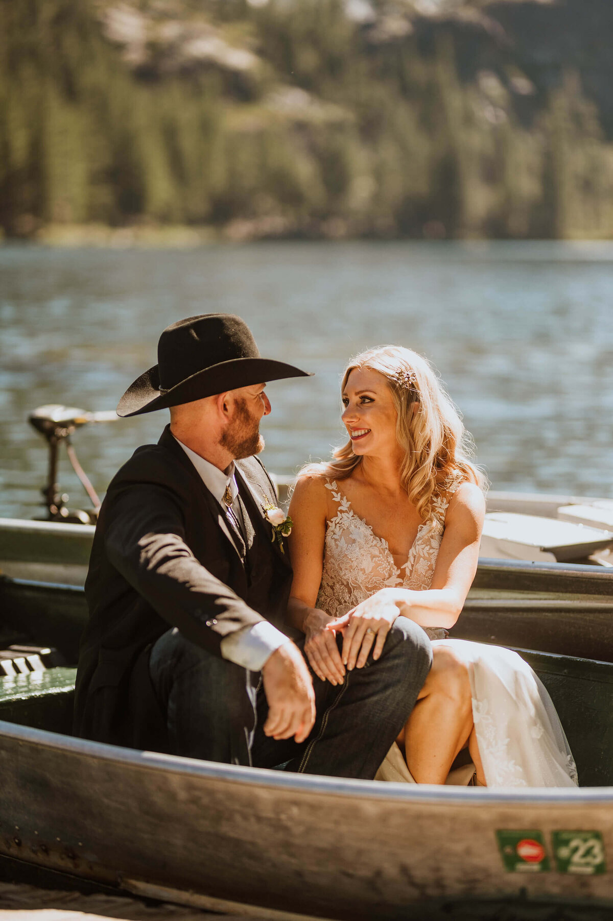A couple in wedding attire on Sardine Lake.