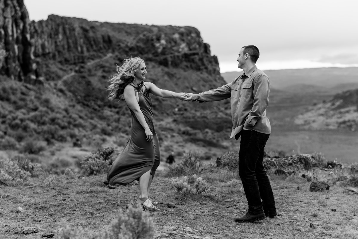 couple dancing on cliffs