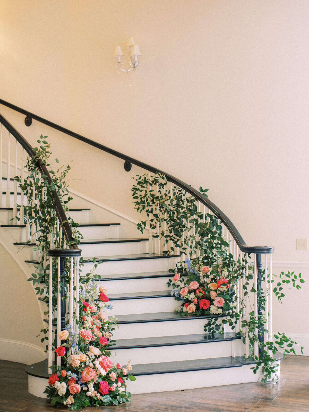 Beautiful floral staircase at Ashton Gardens wedding venue in North Texas