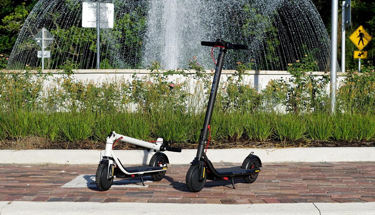 Scoot E-3 by the Water Fountain