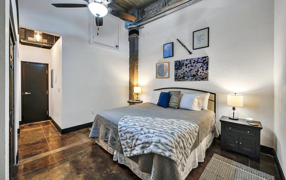 Beautiful king size bed in this one-bedroom, one-bathroom vintage industrial condo with Smart TV, free Wi-Fi, and washer/dryer located in downtown Waco, TX.