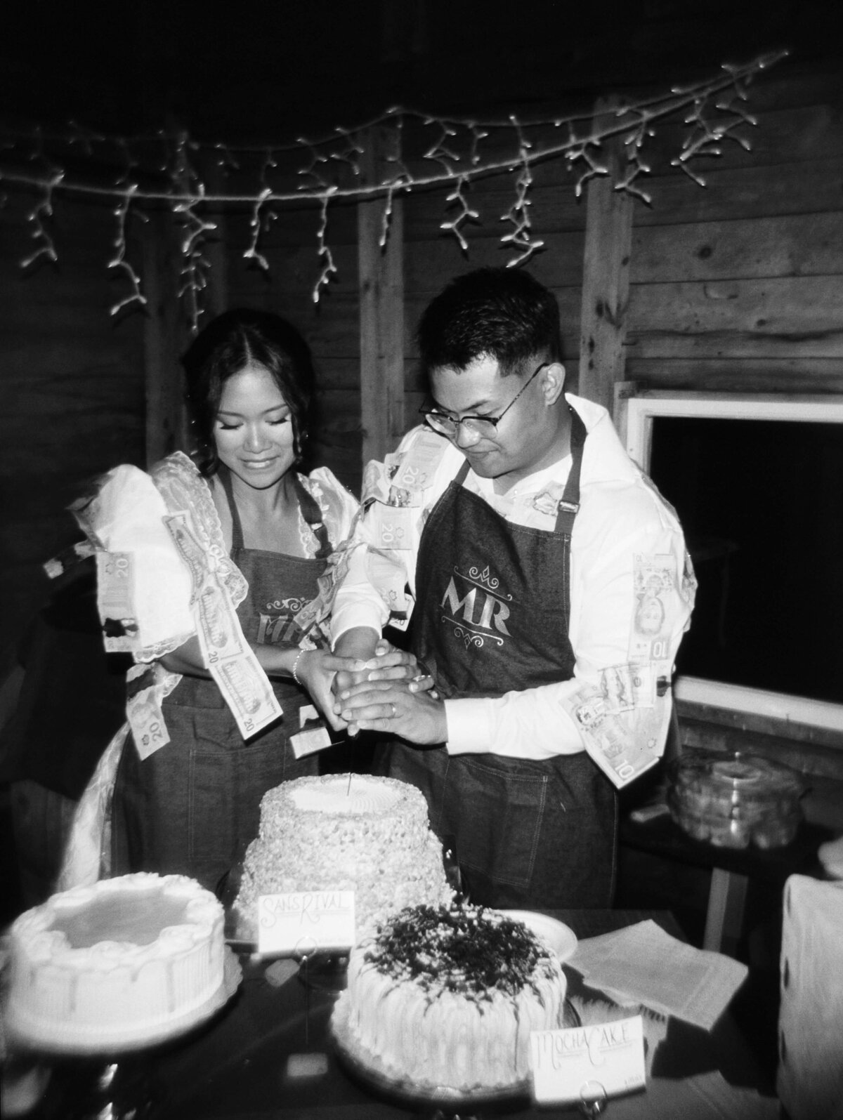 Bride and groom cutting cake at  Woodburn Ridge Wedding, Nova Scotia