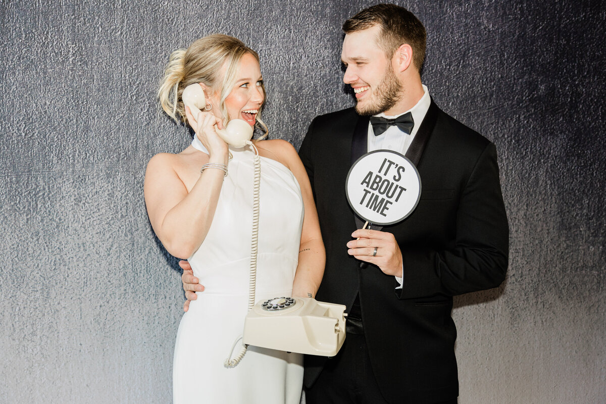Bride & Groom taking a picture at a photo booth