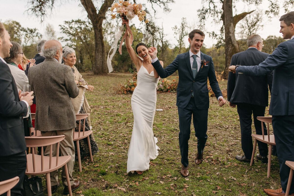 Campovida wedding ceremony recessional pink chairs