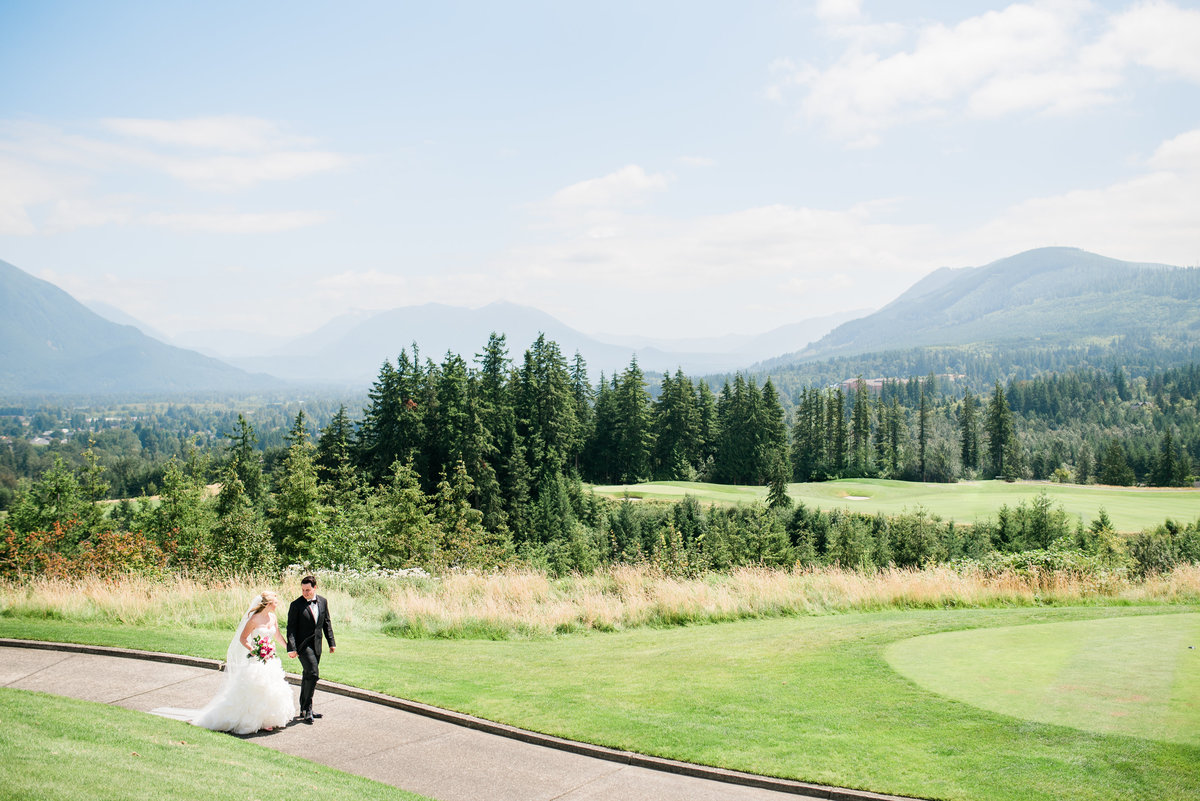 bride and groom walking trough TCP Ridge Snoqualmie Golf course