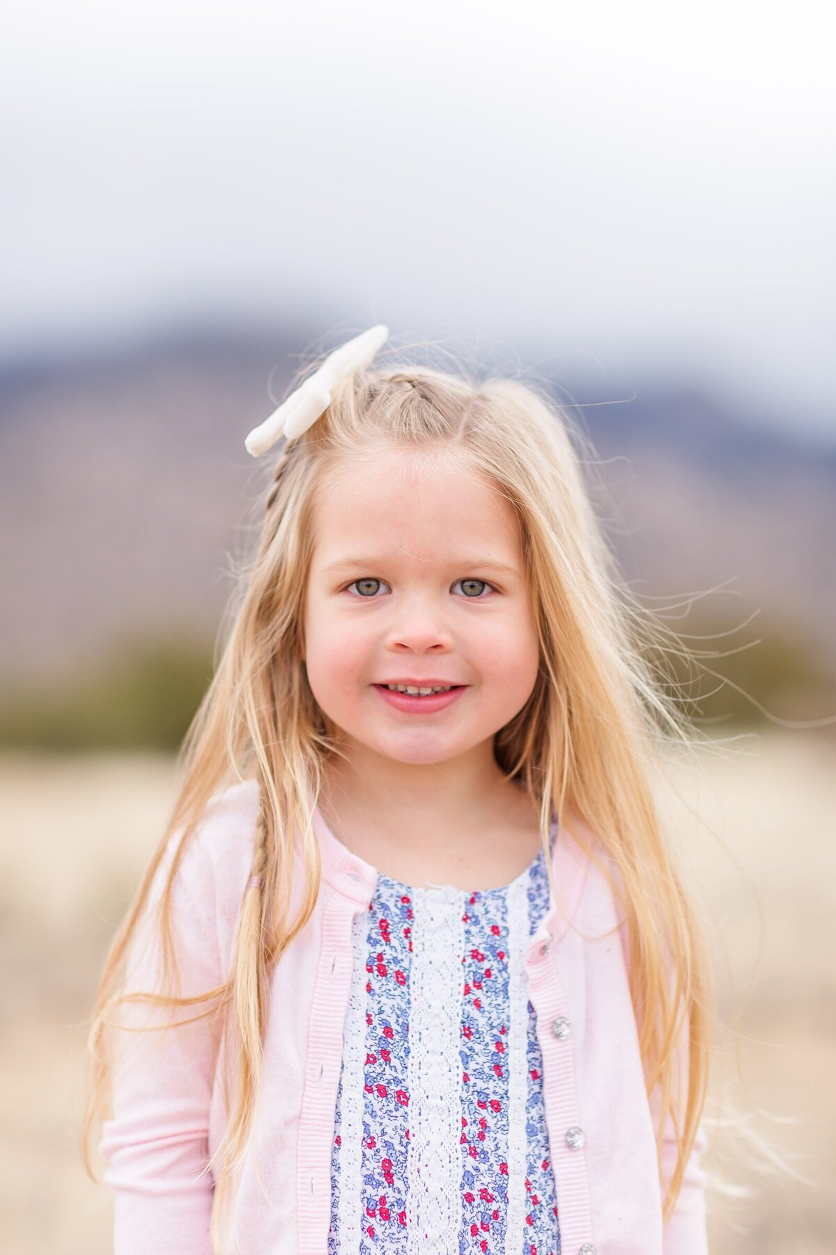 Little girl smiling for Erin Thompson Photography