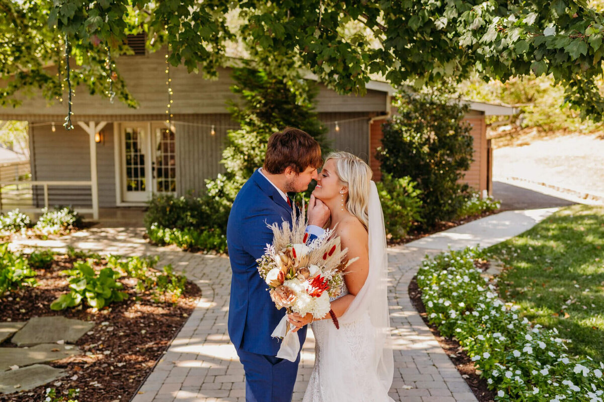 photo of a bride and groom about to kiss at a tennessee wedding