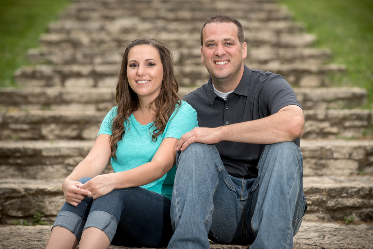 engagement-portrait-on-historic-stone-steps-at-Pottowatomi-Park-in-St-Charles-Illinois