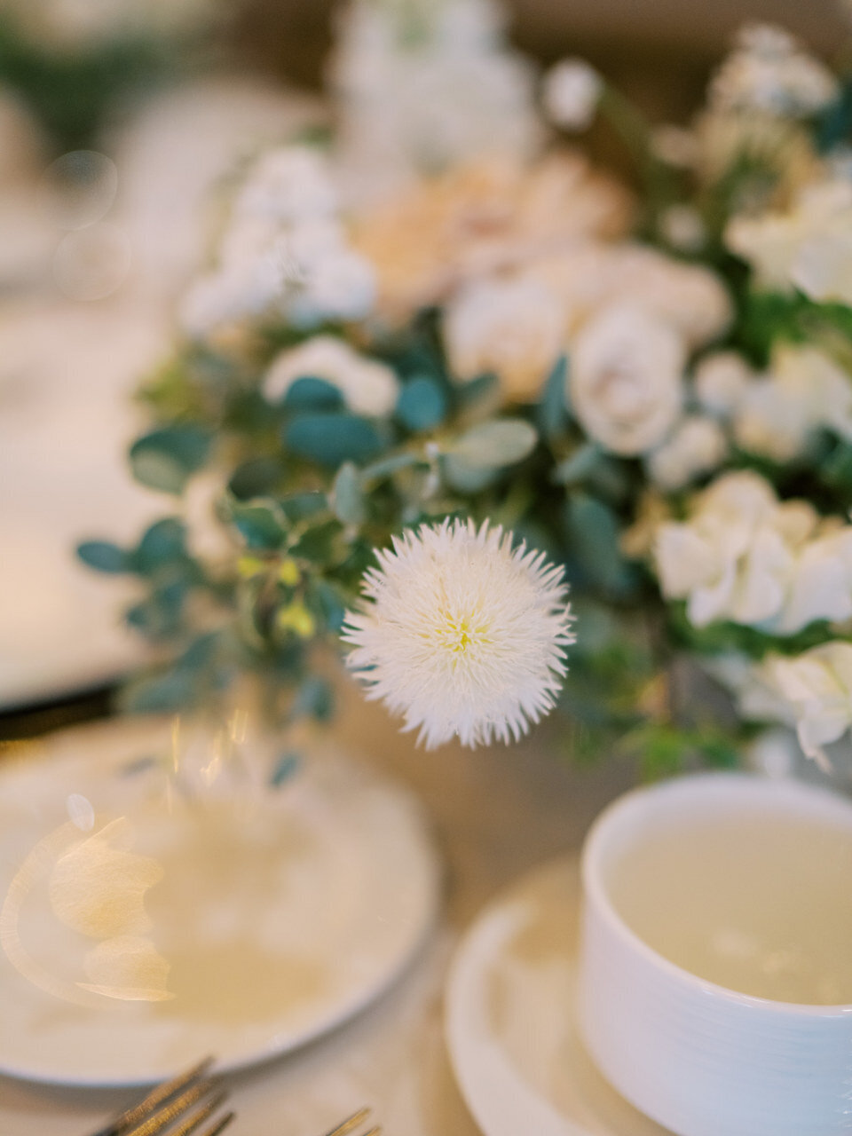 whimsical wedding centerpiece white and green floral
