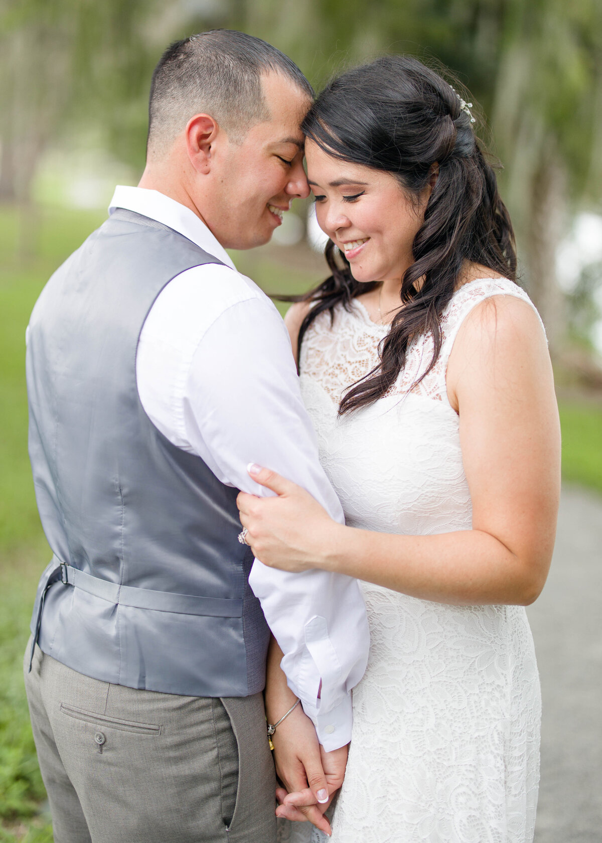bride and groom intimate moment byby Lucas Mason Photography in Orlando, Windermere, Winder Garden area