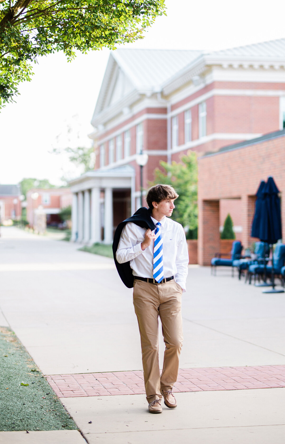 high school senior boy walking at McCallie School in Chattanooga