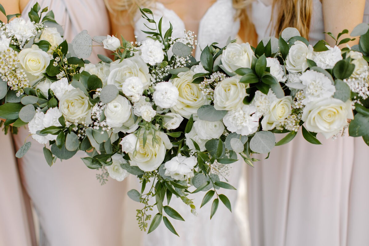 Close up photo of bride and bridesmaids bouquets