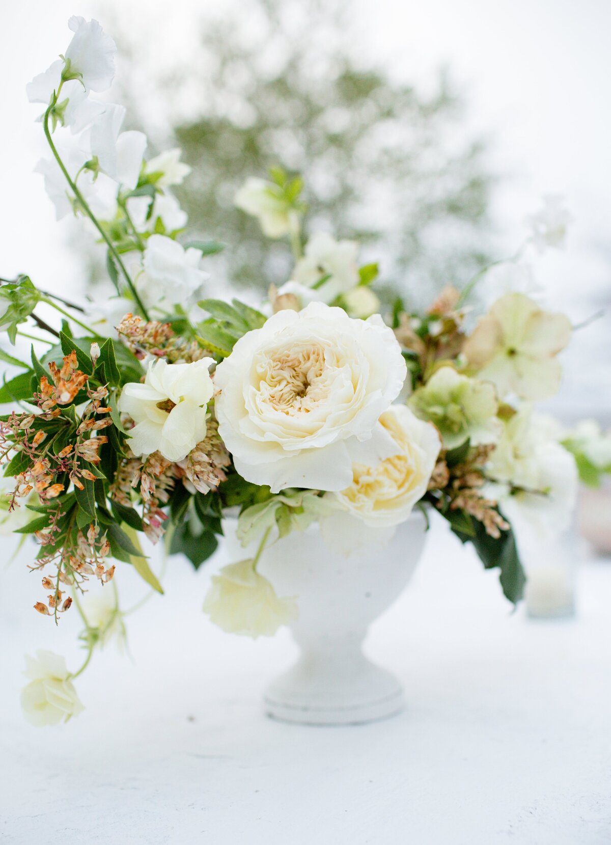 a-table-bouquet-with-green-accents