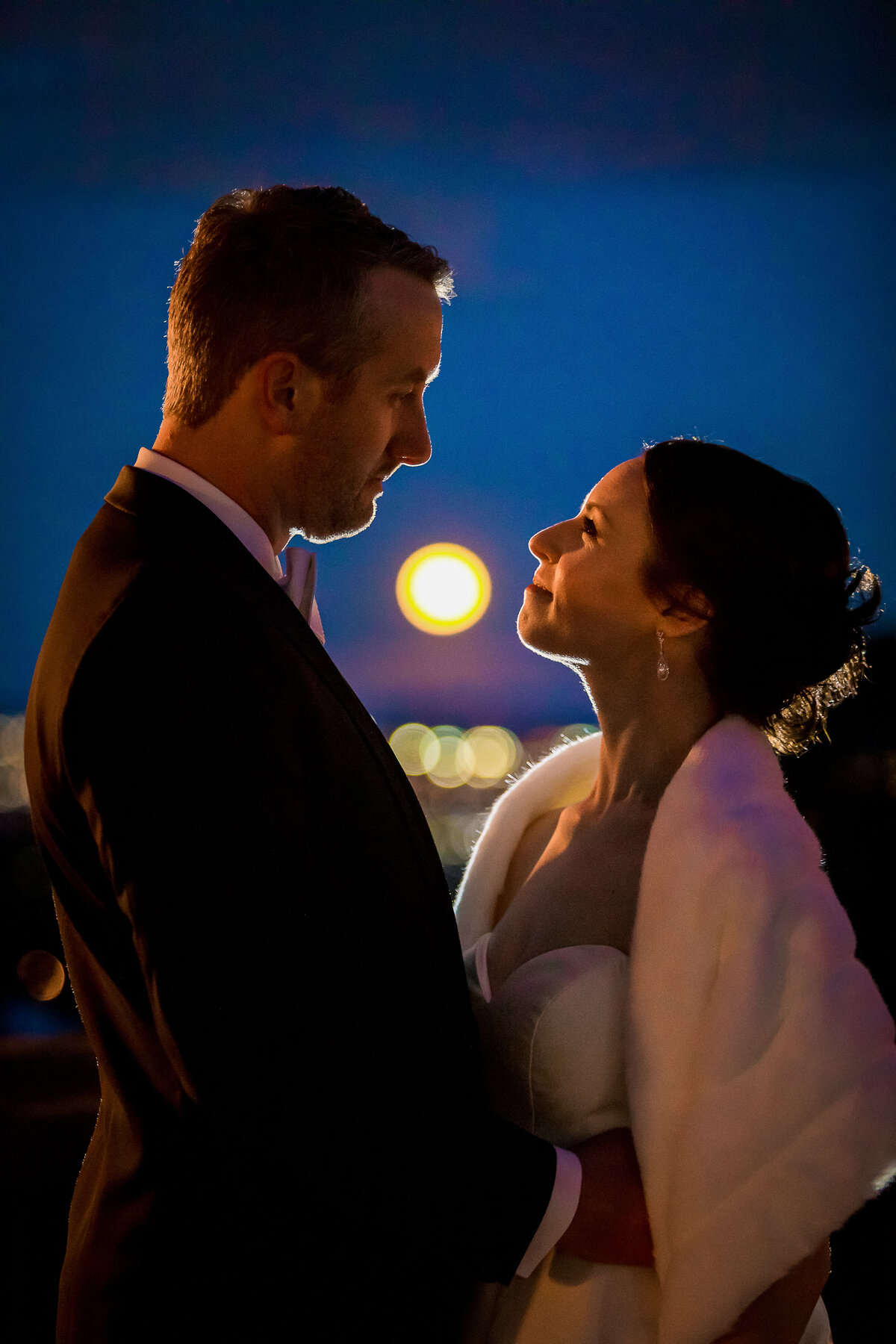 Bride and Groom at the Cheyenne Mountain Lodge with Moon in the Background