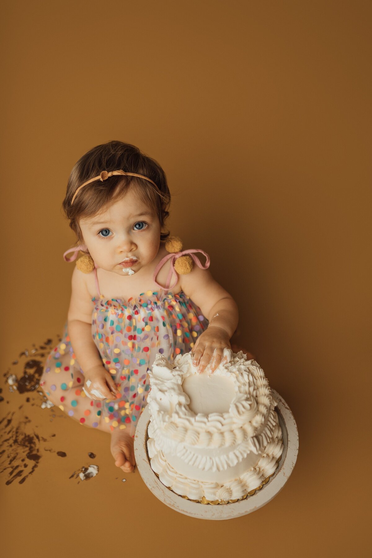 girl during cake smash session in st. pete