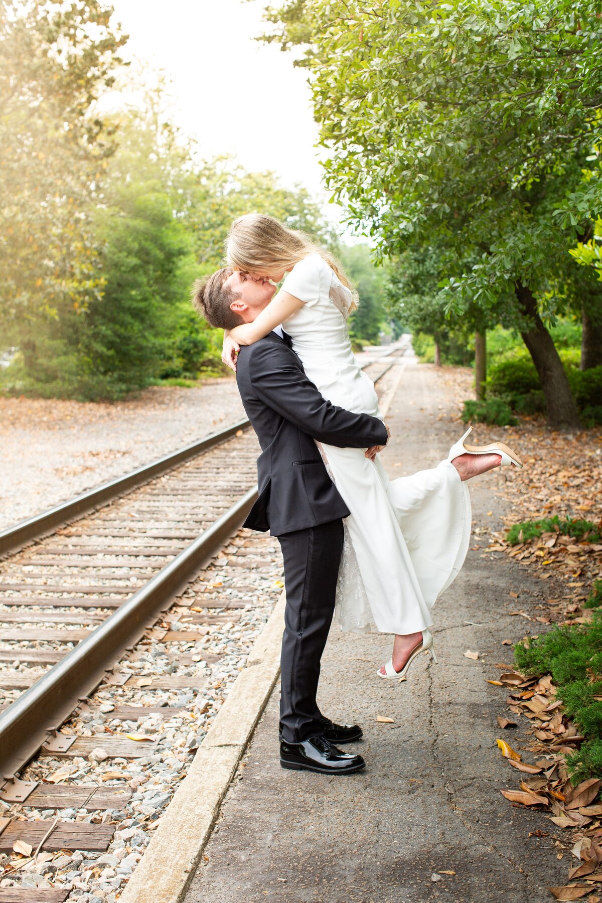 bride-groom-train-tracks-downtown-southern-pines