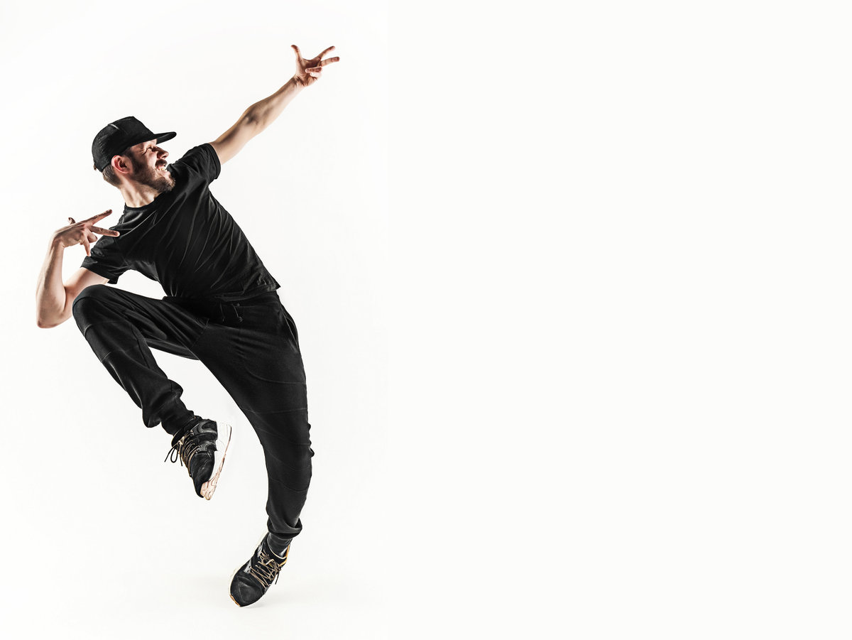 the-silhouette-of-one-hip-hop-male-break-dancer-PHLQP78