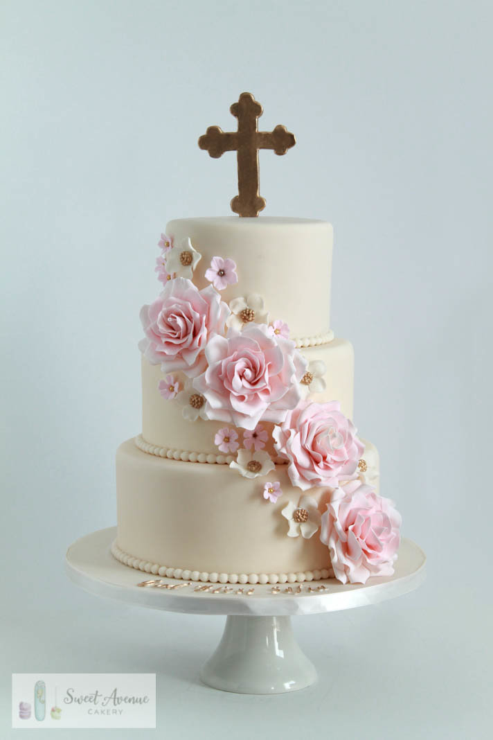 elegant baptism or communion cake with pink roses