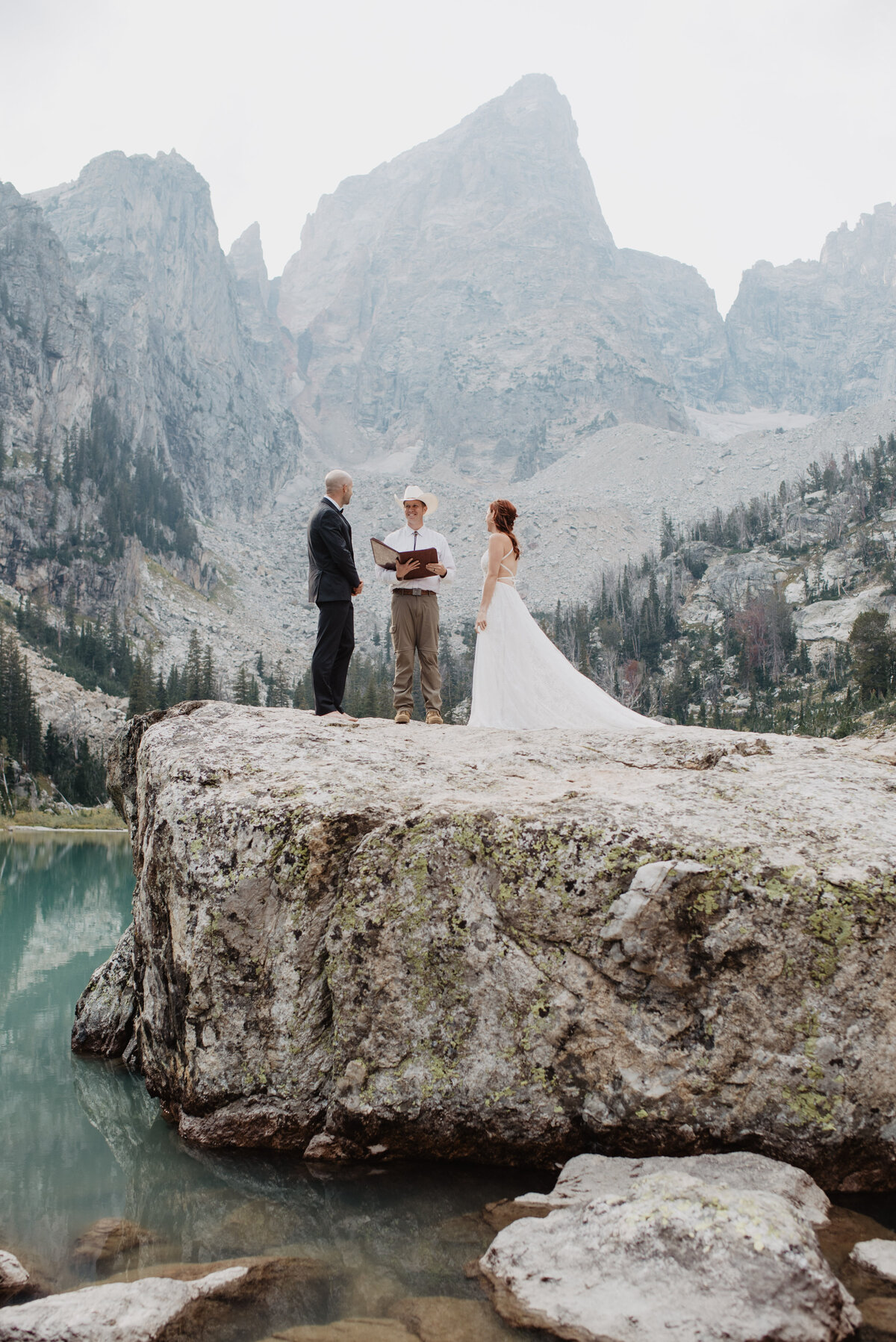 Jackson Hole photographers capture bride and groom during wedding ceremony
