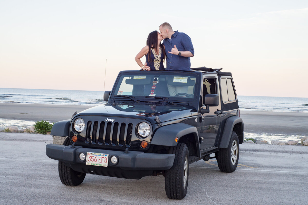 Engaged Couple in Jeep on the beach in Maine