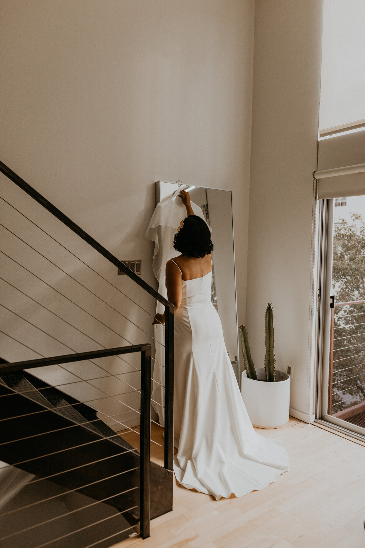bride getting ready in a modern apartment