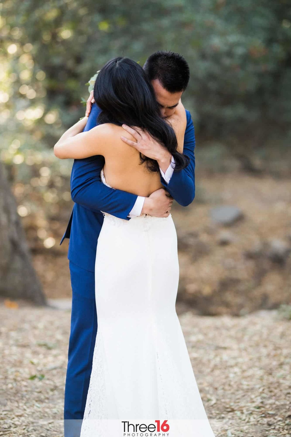 Tender moment between Bride and Groom as they embrace each other