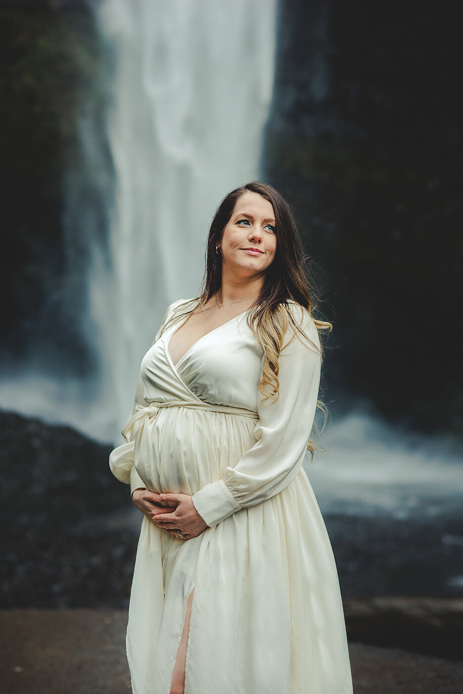 Pregnant woman and waterfall