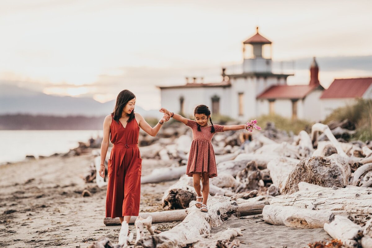 mom-dancing-with-daughter-near-west-lighthouse-seattle