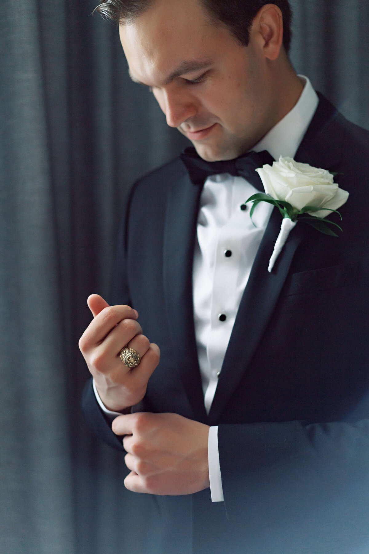 groom in classic black tux