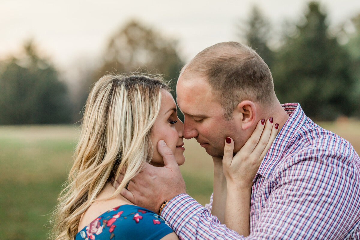 Tender Moment Between Husband and Wife  during  Maternity Photo Session in Clark, NJ