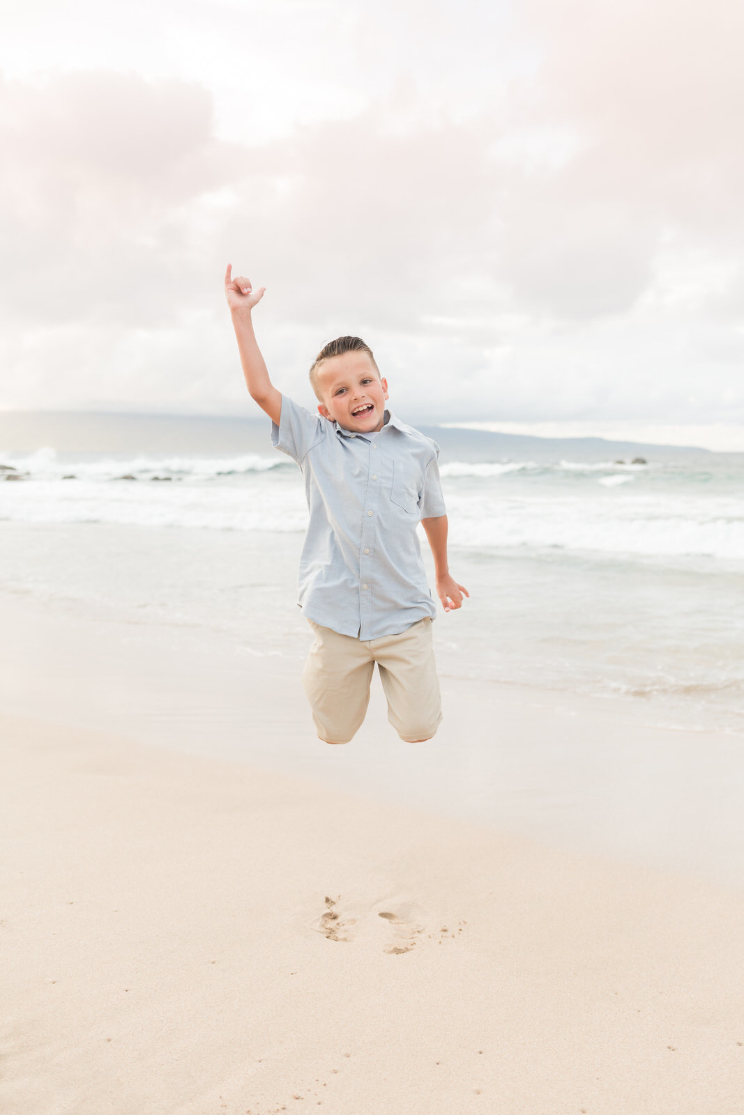 Maui family photography - boy jumping