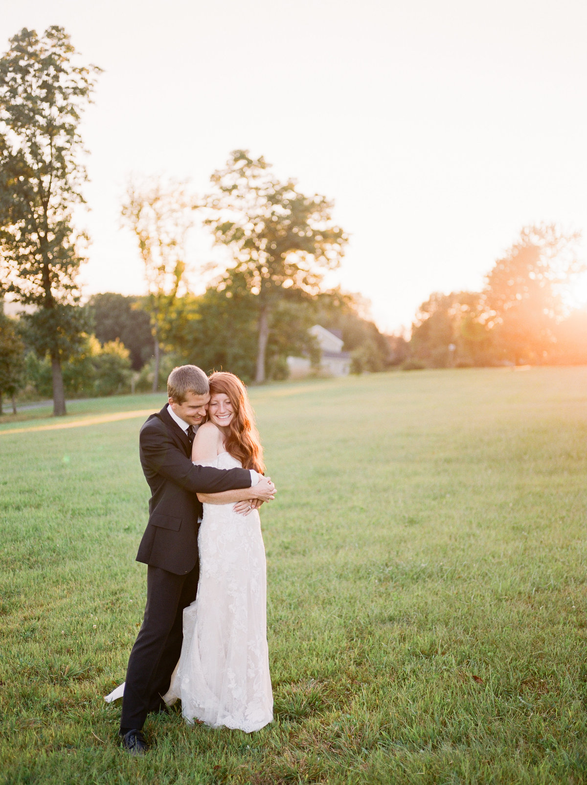 couple hugging during golden hour portraits