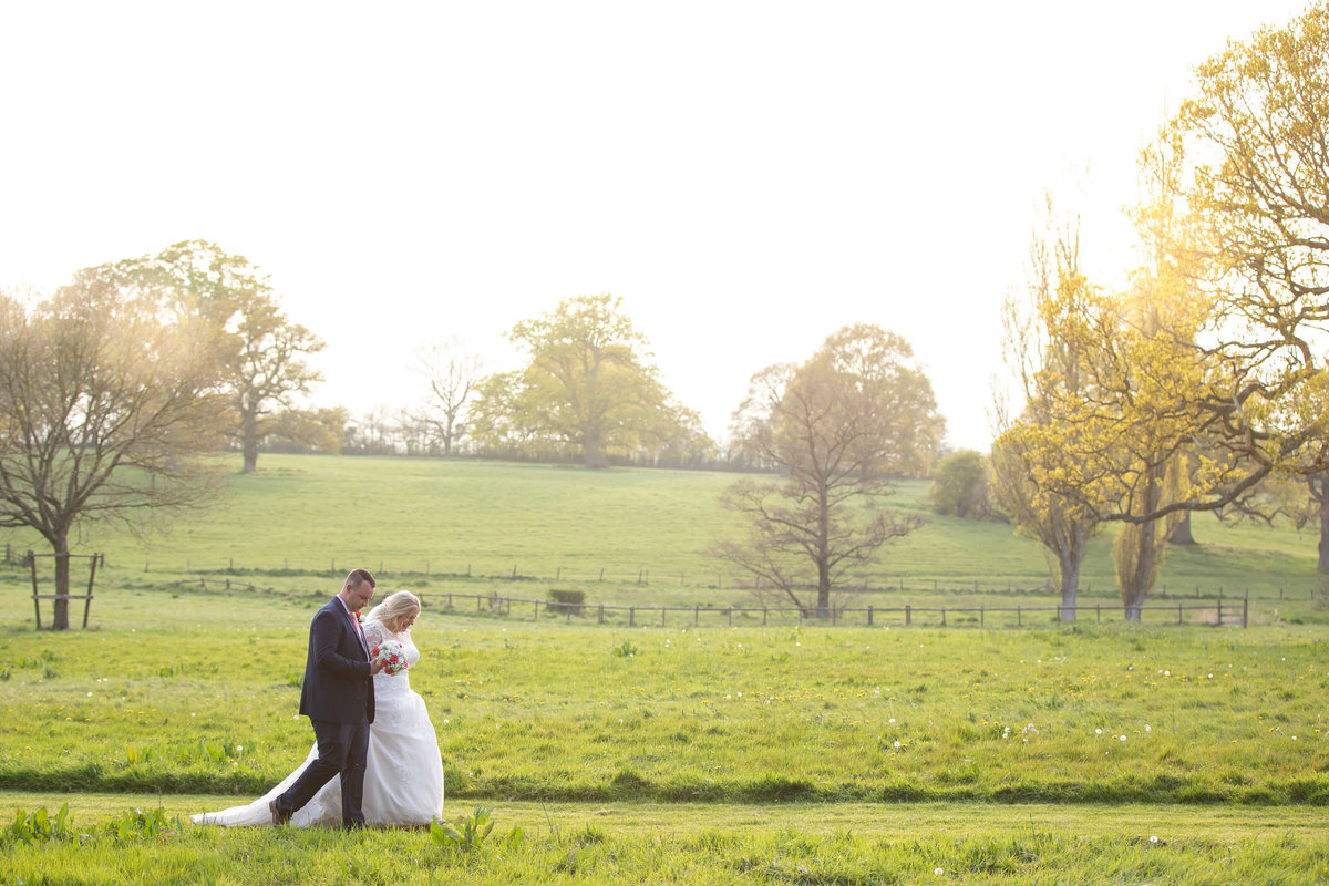Wedding photo of couple in grounds of Rockbeare Manor Devon_