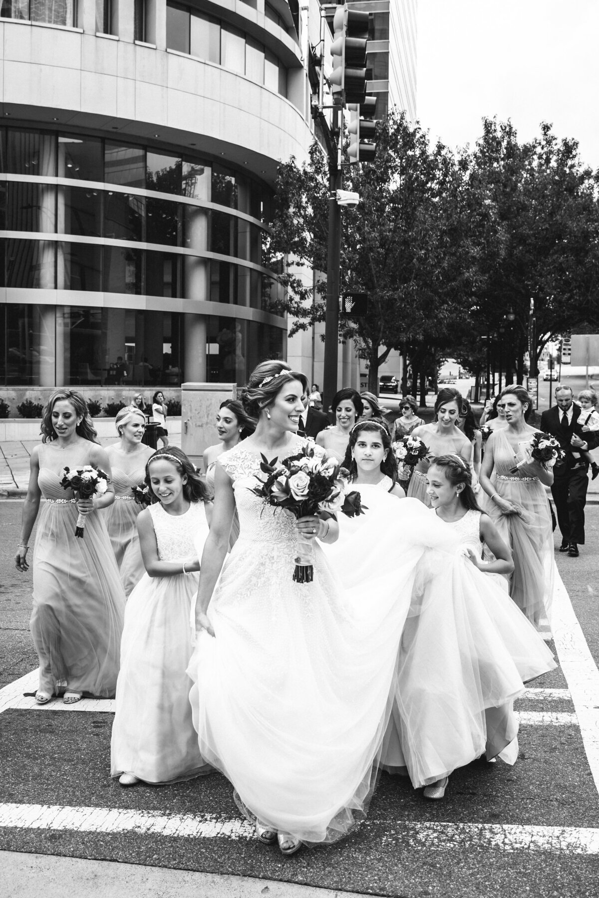 Bridal party crossing street Uptown Wedding