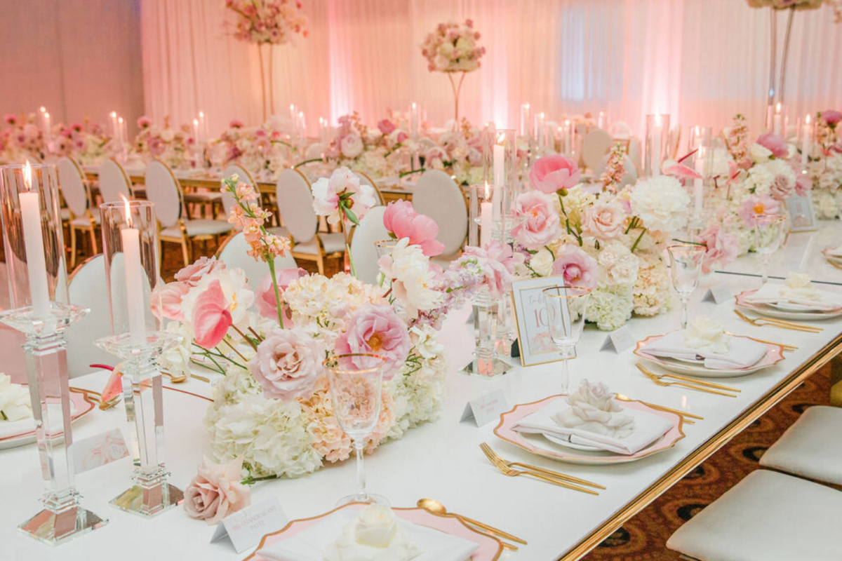 pink-gold-ivory-engagement-party-flowers-centerpieces-candles-chargers