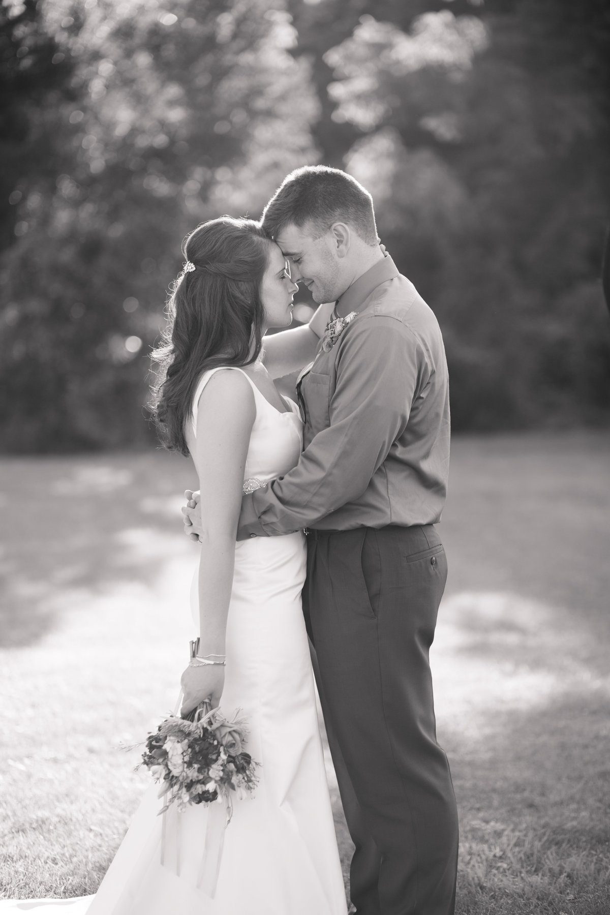 Jordan and Kelcee have an outoor Pittsburgh Pa Wedding at a family home.