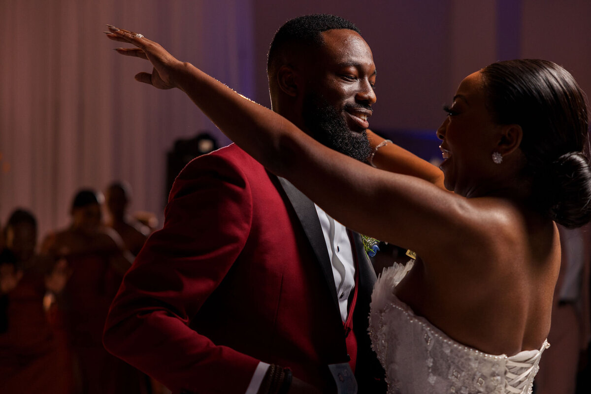 Tomi and Tolu Oruka Events Ziggy on the Lens photographer Wedding event planners Toronto planner African Nigerian Eyitayo Dada Dara Ayoola ottawa convention and event centre pocket flowers Navy blue groom suit ball gown black bride classy  91