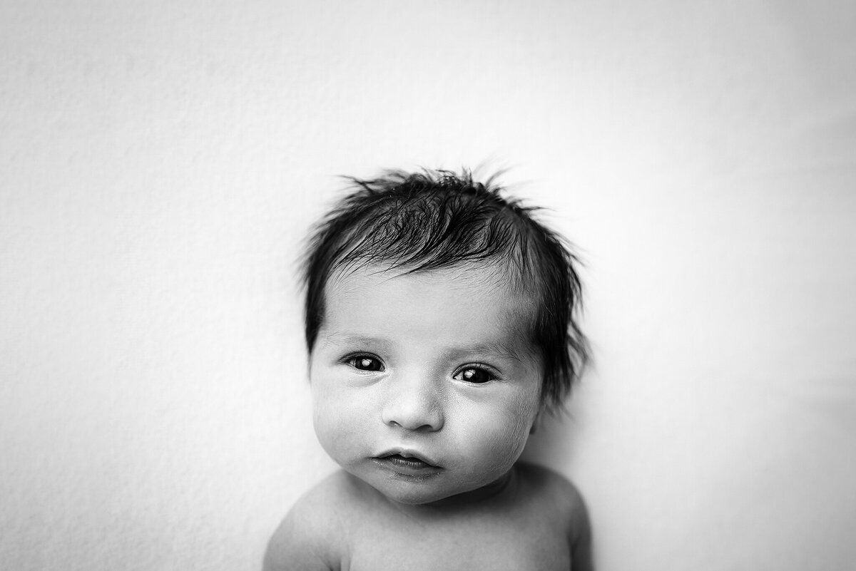 Expression newborn portrait  in black and white in Jacksonville, FL.