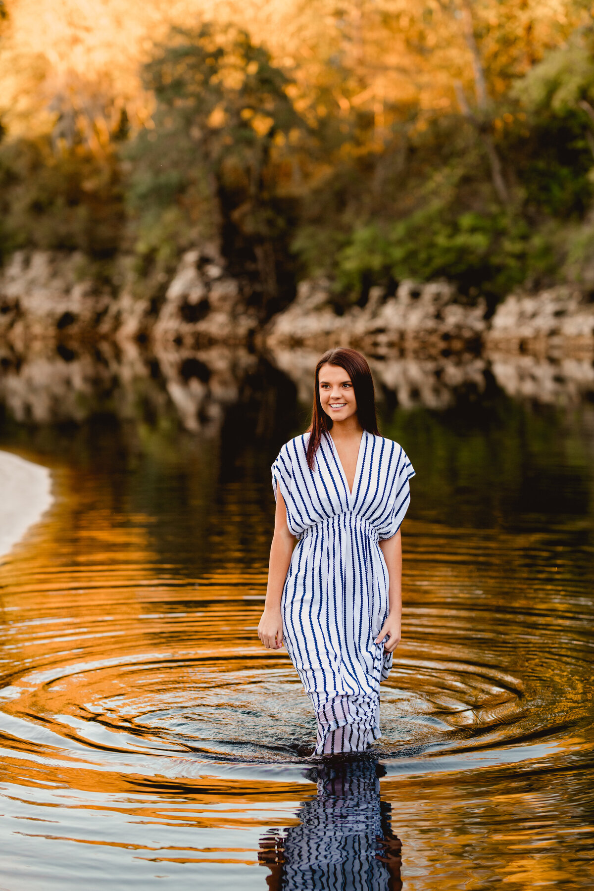 Senior pics in the river in North Florida with photographer